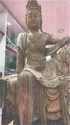 Ancient Buddha carved in wood